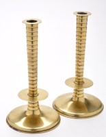 Lot 858 - A fine pair of Charles II brass 'trumpet based'...