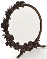 Lot 875 - An early 20th Century patinated bronze framed...