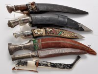 Lot 900 - A quantity of Middle and Far Eastern knives,...