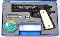 Lot 1057 - A Colt model 1911 A1 eight shot .177cal. air...