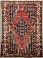 Lot 1112 - A Kurdish Maslaghan rug, with jaggered diamond-...