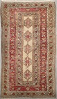 Lot 1115 - A Turkish rug, the small central field with...