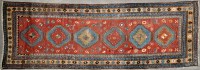 Lot 1123 - A Kurdish runner, decorated with six...