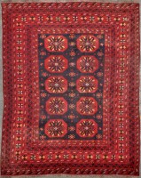 Lot 1135 - An Afghan carpet, the central field decorated...