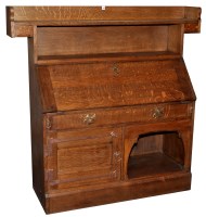 Lot 1169 - An Arts & Crafts oak bureau, by Liberty & Co.,...