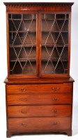 Lot 1182 - A late George III mahogany secretaire bookcase,...