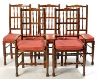 Lot 1193 - A set of twelve stained beech country style...