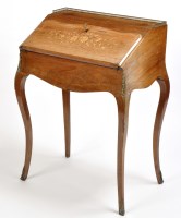 Lot 1201 - A late 19th Century French inlaid walnut...