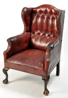 Lot 1203 - A late 19th Century Georgian style wing back...