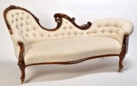 Lot 1215 - A Victorian carved mahogany chaise longue, the...