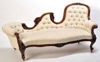 Lot 1216 - A Victorian carved mahogany chaise longue, the...