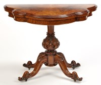 Lot 1226 - A Victorian burr walnut turn over top card...