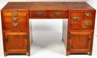 Lot 1239 - A Chinese hardwood campaign style partner's...