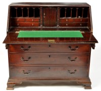 Lot 1251 - A George III mahogany bureau, the fall flap...