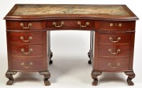 Lot 1252 - A 20th Century mahogany serpentine front...