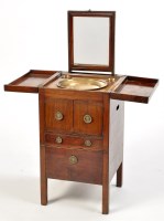 Lot 1256 - A George III mahogany wash stand, the square...