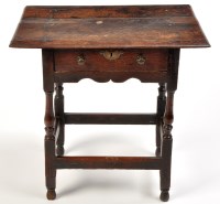 Lot 1264 - An early 18th Century oak lowboy, the...