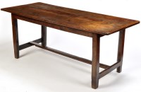 Lot 1266 - A rustic oak and elm refectory dining table,...