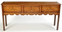 Lot 1272 - A mid 18th Century oak dresser, with three...