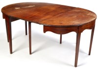 Lot 1275 - A George III mahogany D-end dining table with...