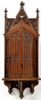 Lot 1280 - A Victorian Gothic revival carved oak...