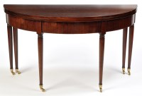 Lot 1288 - A George III and later mahogany turn-over-top...