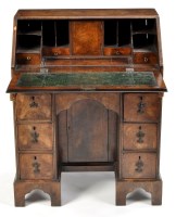 Lot 1293 - An early 18th Century style walnut bureau,...