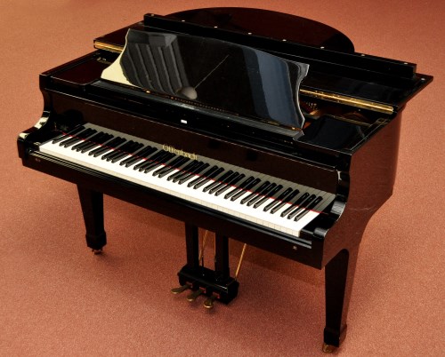 Lot 1295 - An Offenbach baby grand piano in black...