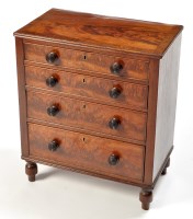 Lot 1301 - A 19th Century mahogany miniature chest, the...