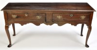 Lot 1303 - An 18th Century and later oak dresser, the...