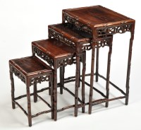 Lot 1311 - An early 20th Century nest of Chinese hardwood...