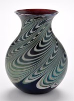 Lot 14 - Okra: An iridescent glass vase, with swirl...