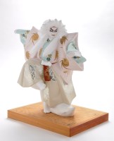 Lot 53 - A Japanese porcelain Hakata doll ''lion dancer'...