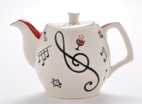 Lot 65 - Gibsons: a teapot, decorated with musical...