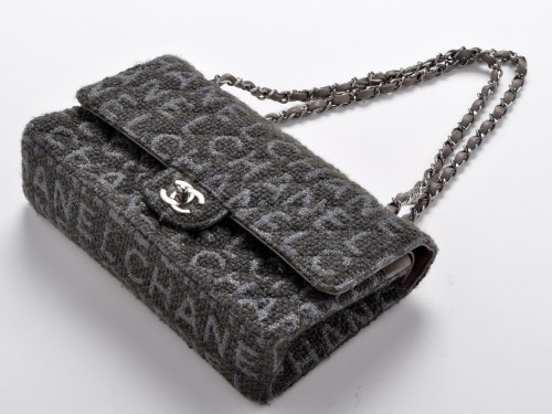 Lot 73 - Chanel: a fabric flap bag, with metal and