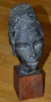 Lot 81A - Artist Unknown: a cast lead female bust, on...