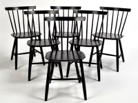 Lot 90 - A set of six Danish ebonised chairs, the...