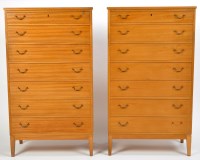 Lot 92 - A pair of Danish teak chests of drawers,...