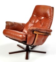 Lot 113 - A Danish style leather and stained teak...