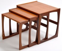 Lot 137 - G-Plan: a nest of teak tables, the larger...