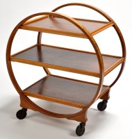 Lot 146 - An Art Deco walnut three-tier trolley of...