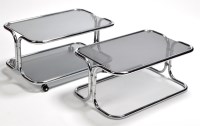 Lot 147 - Eglin: tubular chrome and tinted glass trolley;...