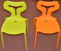 Lot 148 - Two Gresham Area 51 stacking chairs, one in...