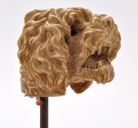 Lot 933 - A late 19th Century carved ivory cane finial,...