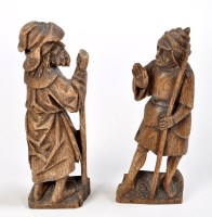 Lot 959 - Attributed to Ralph Hedley: a pair of carved...