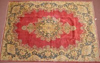 Lot 985 - A Royal Kerman carpet, with central foliate...