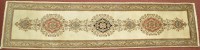 Lot 992 - A Tabriz runner, the ivory field decorated...