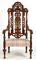 Lot 1026 - A 19th Century Jacobean style oak armchair,...