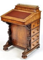 Lot 1029 - A Victorian burr walnut Davenport, the...