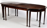 Lot 1040 - A Hepplewhite style mahogany D-end dining...